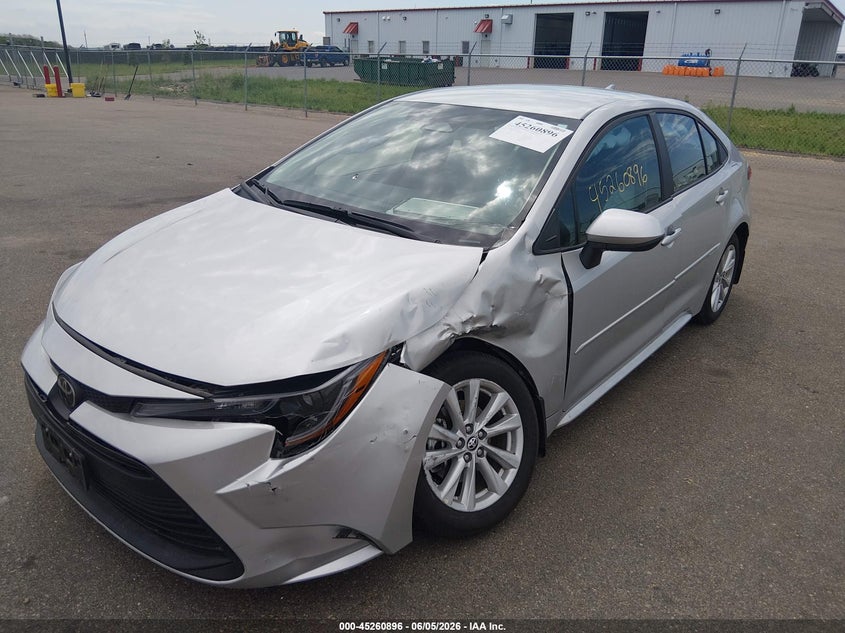 2025 Toyota Corolla VIN 5YFB4MDE0SP339201 IAAI salvage auction — SIDE, Salvage (Minnesota), sold $6,100 on 2026-07-31 (photo 2)