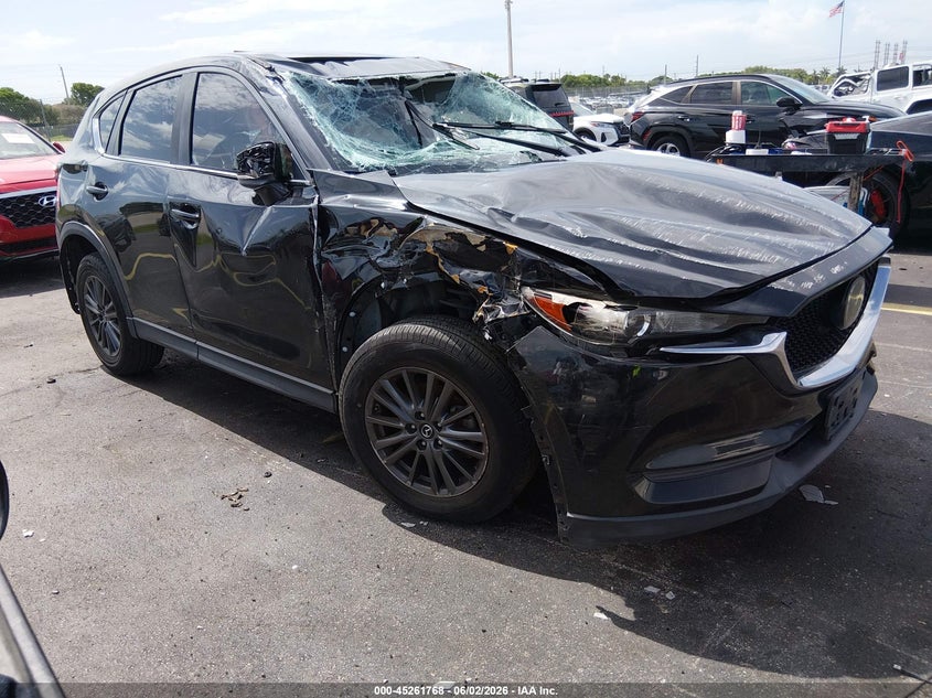2019 Mazda Cx-5 VIN JM3KFACM0K0585894 IAAI salvage auction — ALL OVER, Salvage Title, sold $1,850 on 2026-07-26 (photo 1)