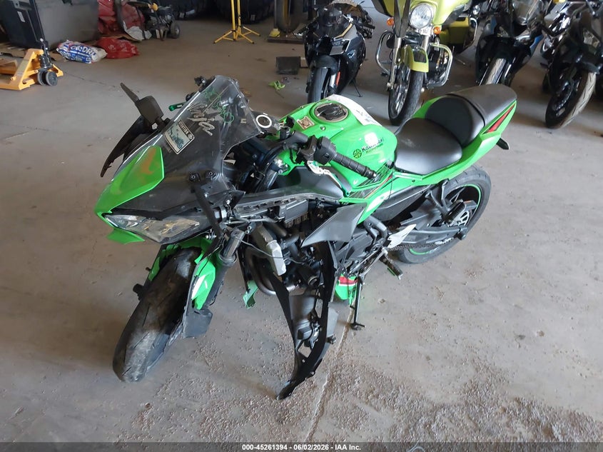 2023 Kawasaki Ninja VIN ML5EXER19PDA83261 IAAI salvage auction — SIDE, Salvage (Indiana), sold $25 on 2026-07-29 (photo 2)
