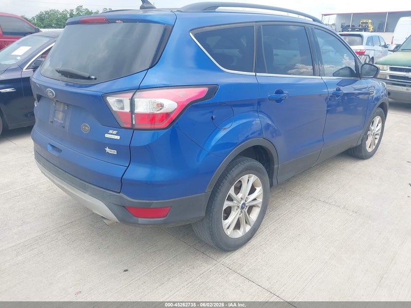 2018 Ford Escape VIN 1FMCU0GD2JUC18800 IAAI salvage auction — NORMAL WEAR, Original (Texas), sold $1,350 on 2026-07-24 (photo 4)