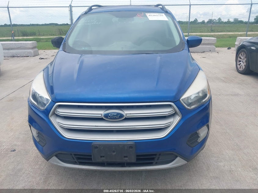 2018 Ford Escape VIN 1FMCU0GD2JUC18800 IAAI salvage auction — NORMAL WEAR, Original (Texas), sold $1,350 on 2026-07-24 (photo 6)
