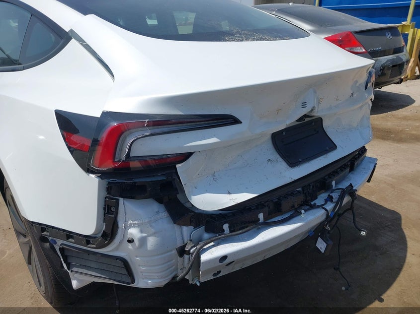 2025 Tesla Model 3 VIN 5YJ3E1EA6SF064909 IAAI salvage auction — FRONT & REAR, Salvage Title, sold $11,300 on 2026-07-12 (photo 6)