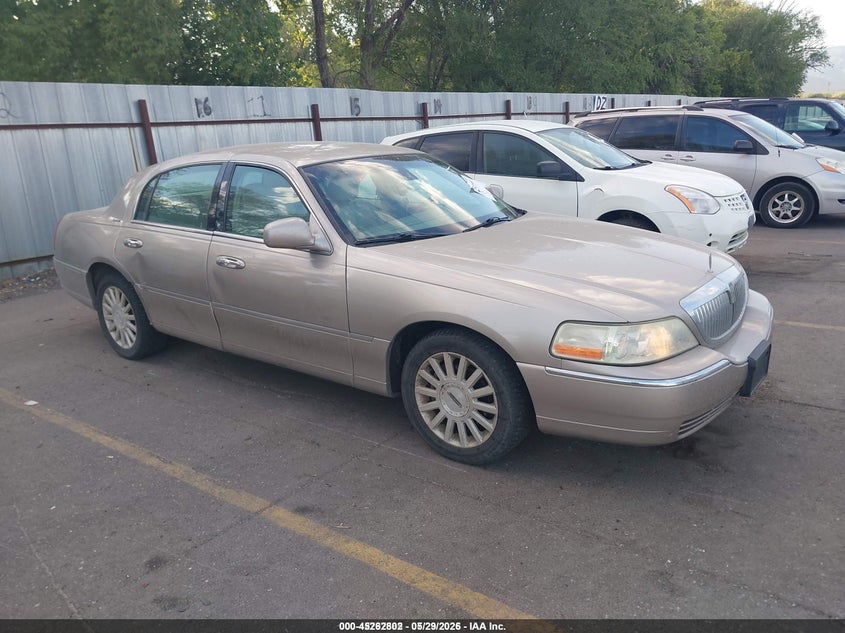 2003 Lincoln TOWN CAR VIN 1LNHM82W93Y696835 IAAI salvage auction — FRONT & REAR, Salvage (Idaho), sold $275 on 2026-07-09 (photo 1)
