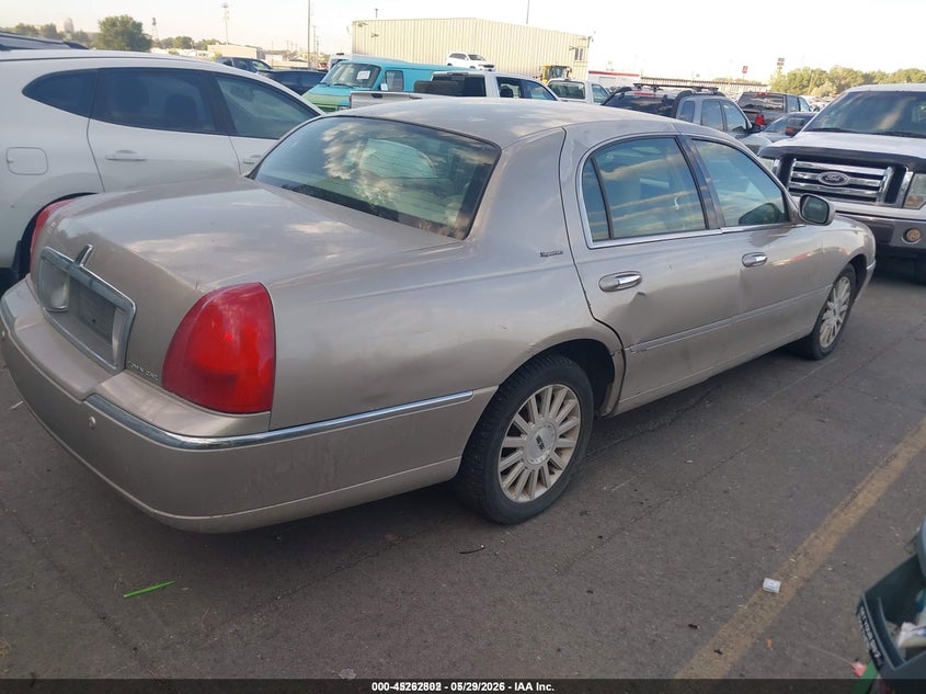 2003 Lincoln TOWN CAR VIN 1LNHM82W93Y696835 IAAI salvage auction — FRONT & REAR, Salvage (Idaho), sold $275 on 2026-07-09 (photo 4)