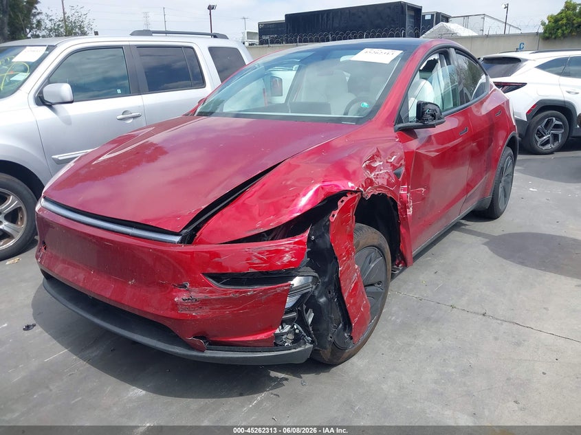 2026 Tesla Model y VIN 7SAYGDED2TA446898 IAAI salvage auction — LEFT FRONT, Salvage Title, sold $17,200 on 2026-07-15 (photo 2)
