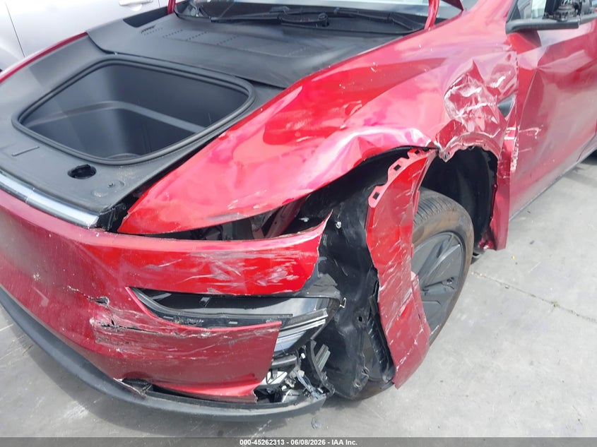 2026 Tesla Model y VIN 7SAYGDED2TA446898 IAAI salvage auction — LEFT FRONT, Salvage Title, sold $17,200 on 2026-07-15 (photo 6)