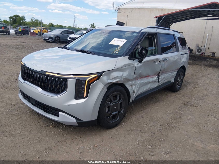 2025 Kia VIN KNDNC5KA5S6070321 IAAI salvage auction — LEFT SIDE, Salvage Title, sold $16,600 on 2026-07-06 (photo 2)
