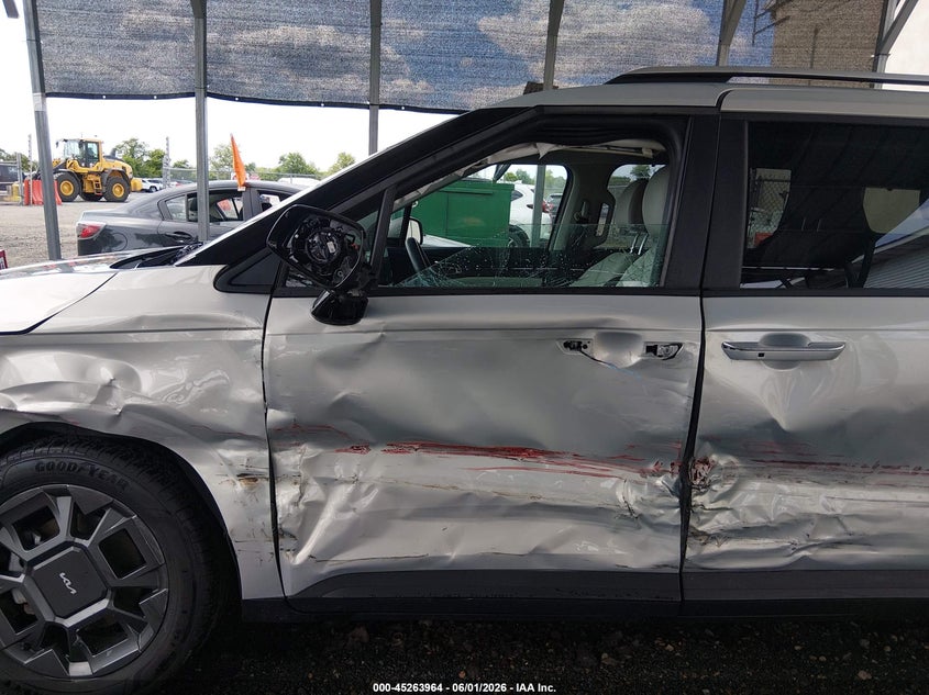 2025 Kia VIN KNDNC5KA5S6070321 IAAI salvage auction — LEFT SIDE, Salvage Title, sold $16,600 on 2026-07-06 (photo 6)