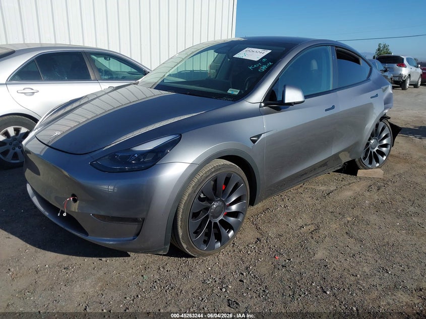 2024 Tesla Model y VIN 7SAYGDEF8RF195060 IAAI salvage auction — LEFT REAR, Salvage Title, sold $11,000 on 2026-07-30 (photo 2)