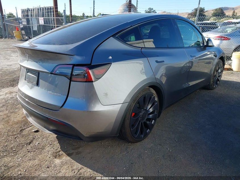 2024 Tesla Model y VIN 7SAYGDEF8RF195060 IAAI salvage auction — LEFT REAR, Salvage Title, sold $11,000 on 2026-07-30 (photo 4)