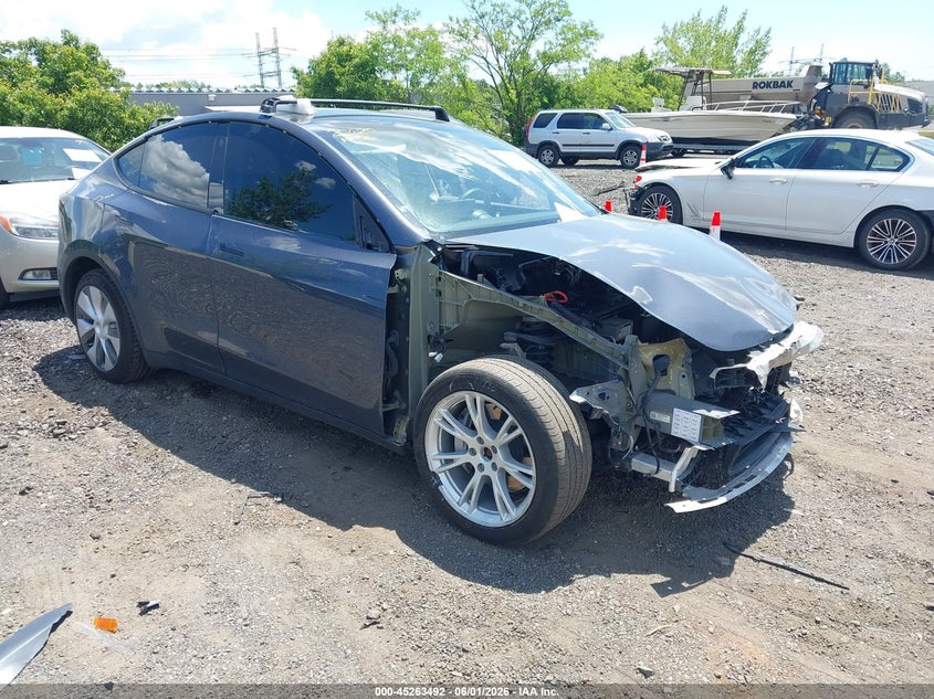 2023 Tesla Model y VIN 7SAYGDEE4PA106134 IAAI salvage auction — FRONT END, Salvage Title, sold $9,300 on 2026-07-09 (photo 1)