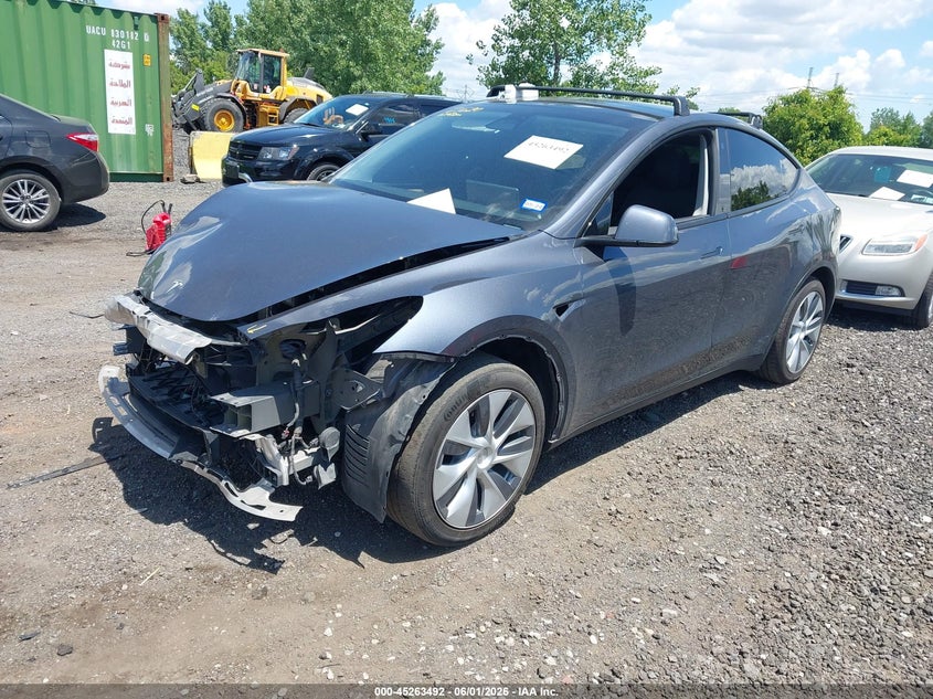 2023 Tesla Model y VIN 7SAYGDEE4PA106134 IAAI salvage auction — FRONT END, Salvage Title, sold $9,300 on 2026-07-09 (photo 2)