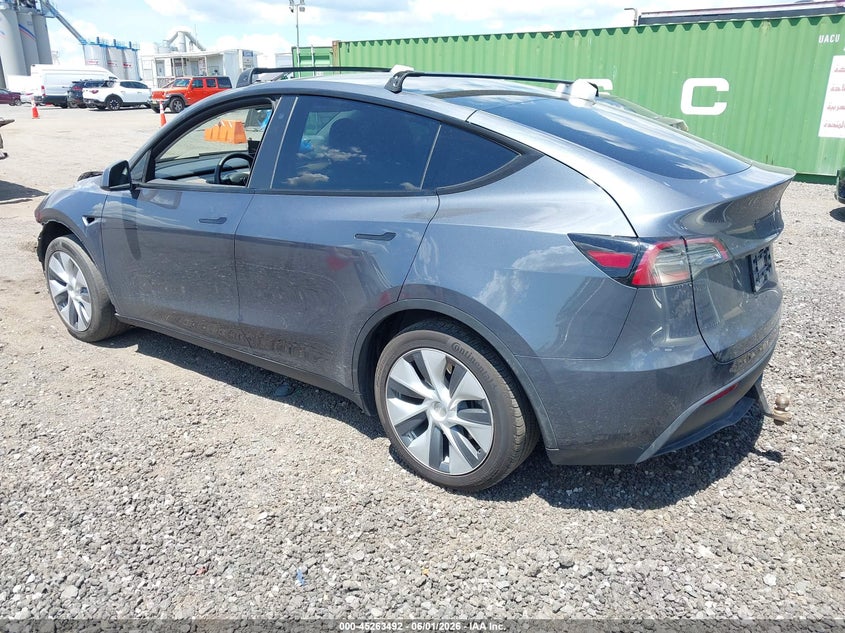 2023 Tesla Model y VIN 7SAYGDEE4PA106134 IAAI salvage auction — FRONT END, Salvage Title, sold $9,300 on 2026-07-09 (photo 3)
