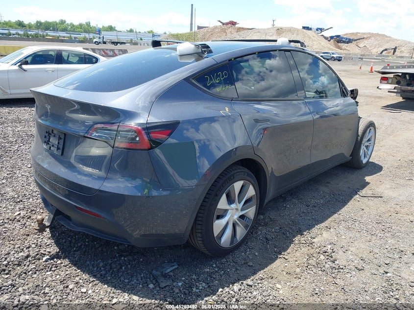 2023 Tesla Model y VIN 7SAYGDEE4PA106134 IAAI salvage auction — FRONT END, Salvage Title, sold $9,300 on 2026-07-09 (photo 4)