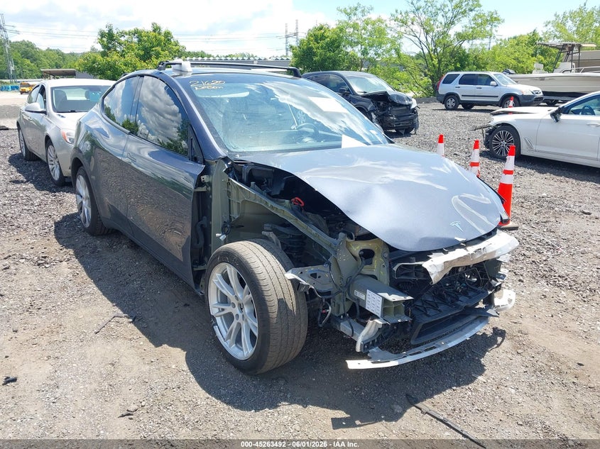 2023 Tesla Model y VIN 7SAYGDEE4PA106134 IAAI salvage auction — FRONT END, Salvage Title, sold $9,300 on 2026-07-09 (photo 6)