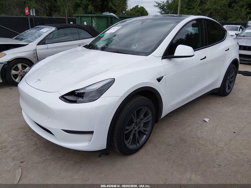 2025 Tesla Model y VIN 7SAYGDED7SA373669 IAAI salvage auction — HAIL, Salvage Title, sold $12,700 on 2026-07-30 (photo 2)