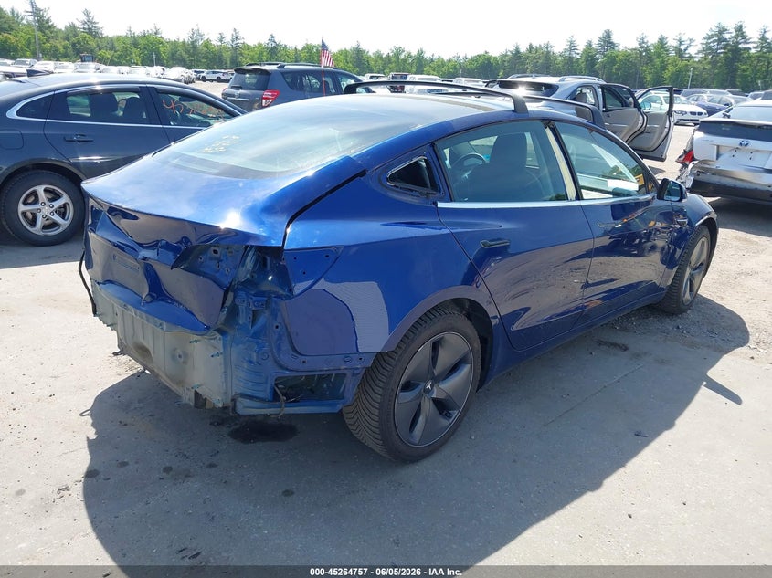 2019 Tesla Model 3 VIN 5YJ3E1EB8KF497561 IAAI salvage auction — REAR END, Salvage Title, sold $4,050 on 2026-07-16 (photo 4)