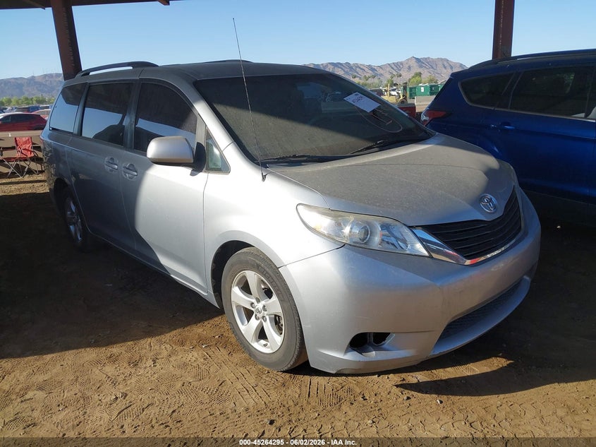 2014 Toyota Sienna VIN 5TDKK3DC5ES447582 IAAI salvage auction — NORMAL WEAR, Salvage Title, sold $3,000 on 2026-07-07 (photo 1)