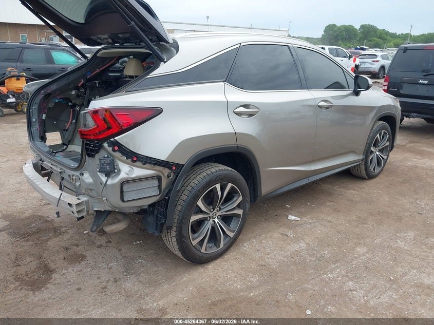 2019 Lexus Rx VIN 2T2BZMCA4KC174071 IAAI salvage auction — REAR END, Salvage Title, sold $14,000 on 2026-08-01 (photo 4)