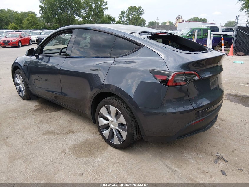 2023 Tesla Model y VIN 7SAYGDEE6PA199982 IAAI salvage auction — HAIL, Salvage Title, sold $14,100 on 2026-07-30 (photo 3)