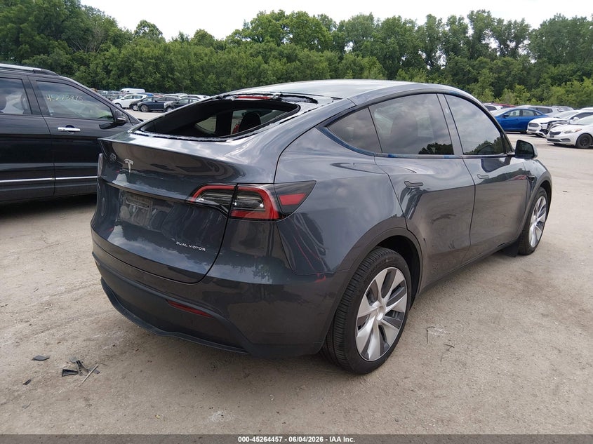 2023 Tesla Model y VIN 7SAYGDEE6PA199982 IAAI salvage auction — HAIL, Salvage Title, sold $14,100 on 2026-07-30 (photo 4)