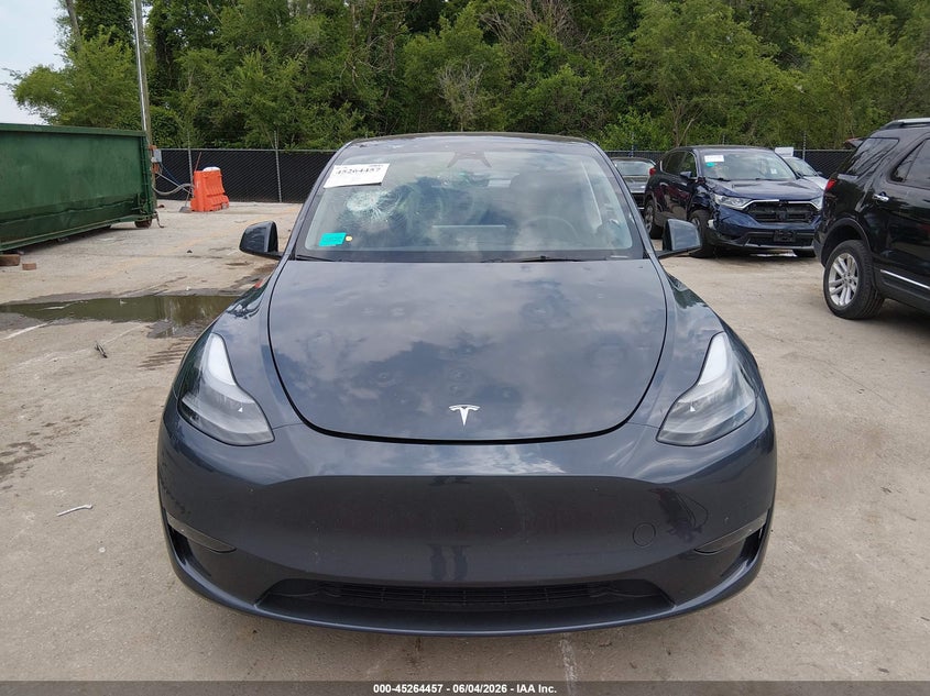 2023 Tesla Model y VIN 7SAYGDEE6PA199982 IAAI salvage auction — HAIL, Salvage Title, sold $14,100 on 2026-07-30 (photo 6)