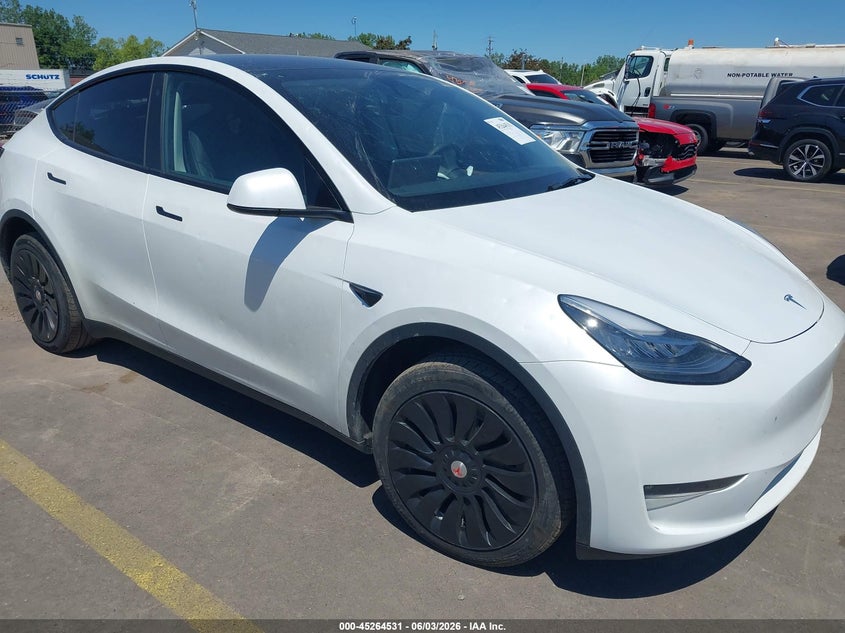 2023 Tesla Model y VIN 7SAYGDEEXPA069476 IAAI salvage auction — HAIL, Salvage Title, sold $18,200 on 2026-07-09 (photo 1)