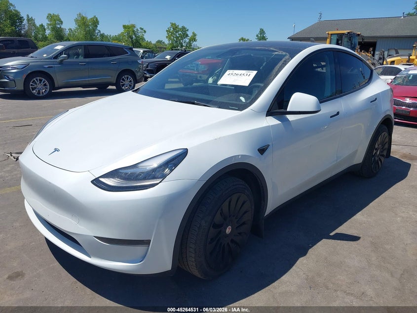 2023 Tesla Model y VIN 7SAYGDEEXPA069476 IAAI salvage auction — HAIL, Salvage Title, sold $18,200 on 2026-07-09 (photo 2)