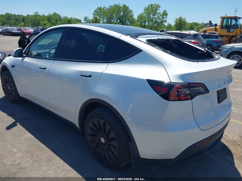 2023 Tesla Model y VIN 7SAYGDEEXPA069476 IAAI salvage auction — HAIL, Salvage Title, sold $18,200 on 2026-07-09 (photo 3)