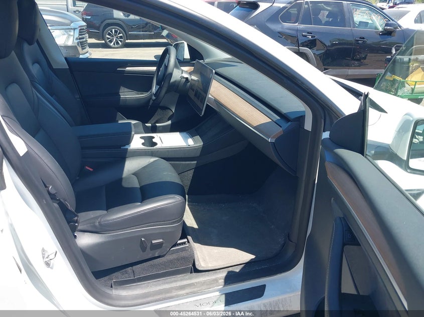 2023 Tesla Model y VIN 7SAYGDEEXPA069476 IAAI salvage auction — HAIL, Salvage Title, sold $18,200 on 2026-07-09 (photo 5)