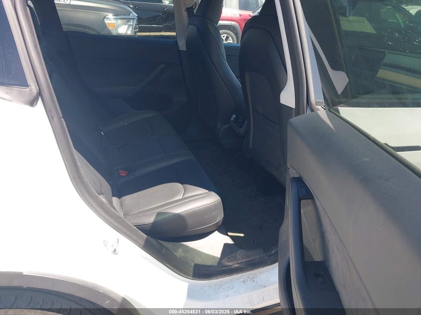 2023 Tesla Model y VIN 7SAYGDEEXPA069476 IAAI salvage auction — HAIL, Salvage Title, sold $18,200 on 2026-07-09 (photo 8)