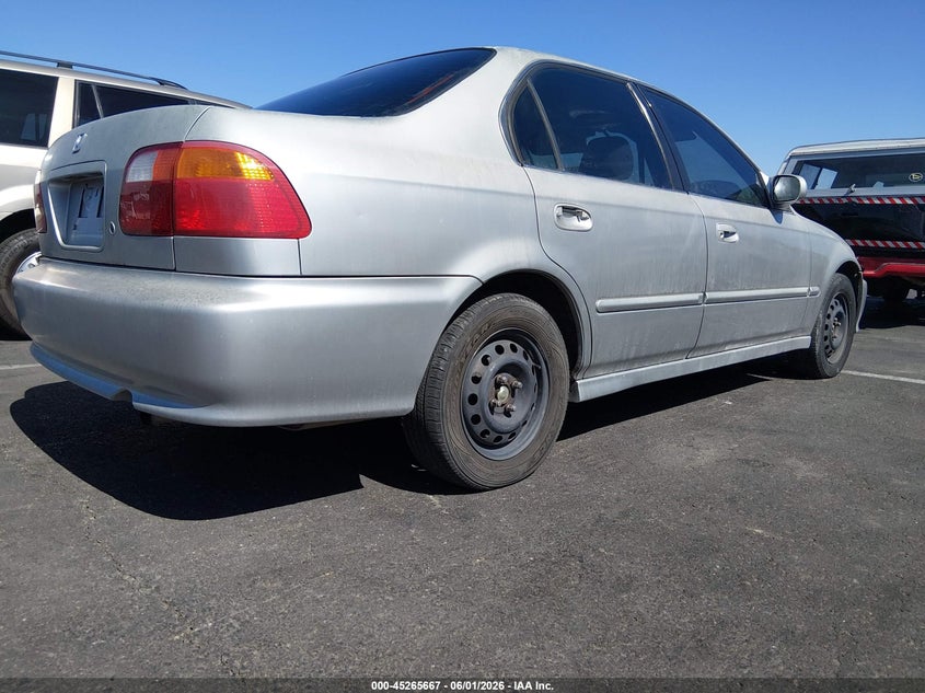 1999 Honda Civic VIN JHMEJ8648XS000904 IAAI salvage auction — NORMAL WEAR, Clear (Nevada), sold $200 on 2026-07-17 (photo 4)