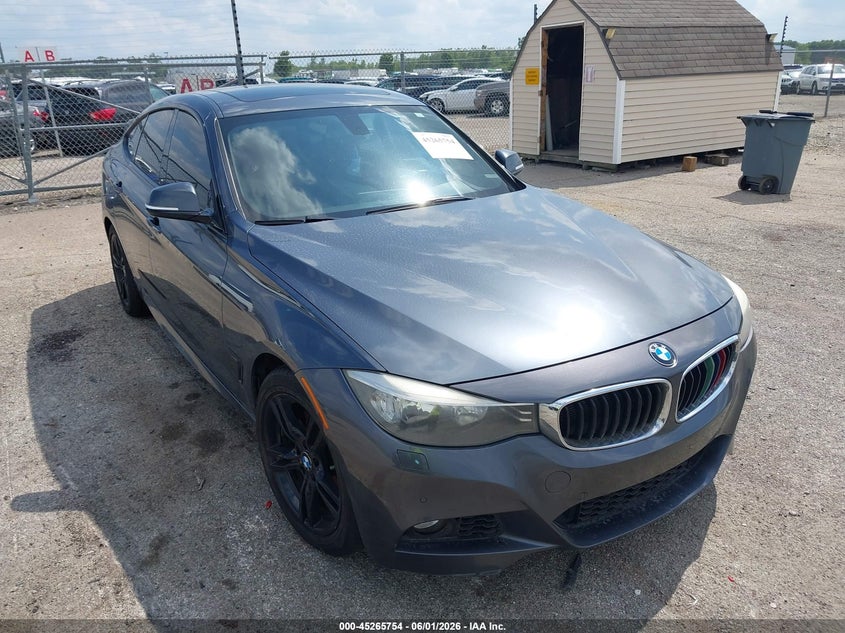 2015 BMW VIN WBA8Z5C50FD672345 IAAI salvage auction — NORMAL WEAR, Salvage Title, sold $1,025 on 2026-07-15 (photo 1)