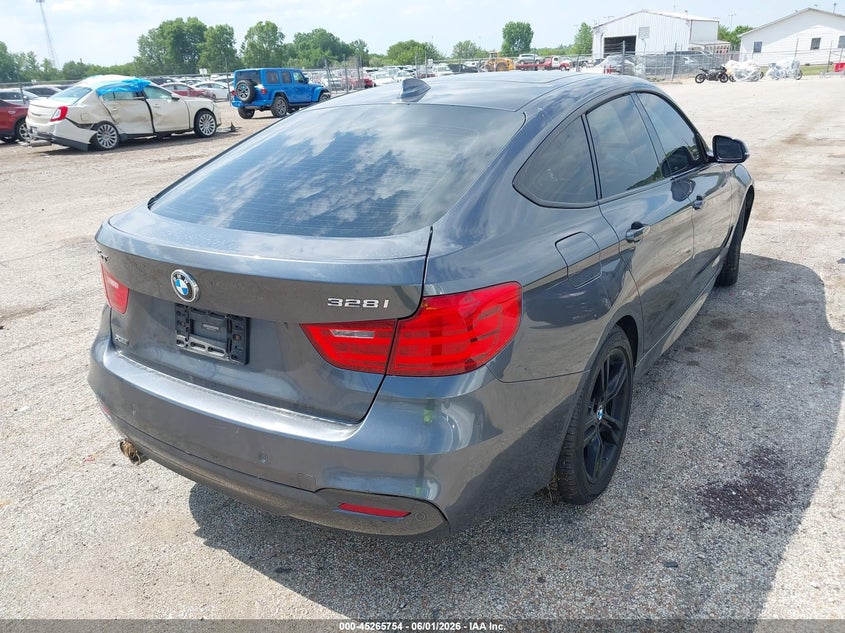2015 BMW VIN WBA8Z5C50FD672345 IAAI salvage auction — NORMAL WEAR, Salvage Title, sold $1,025 on 2026-07-15 (photo 4)
