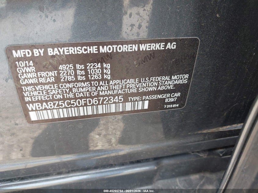 2015 BMW VIN WBA8Z5C50FD672345 IAAI salvage auction — NORMAL WEAR, Salvage Title, sold $1,025 on 2026-07-15 (photo 9)