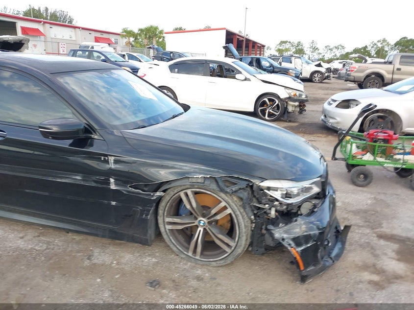 2019 BMW 7er VIN WBA7F0C5XKGM24653 IAAI salvage auction — RIGHT FRONT, Salvage Title, sold $5,600 on 2026-07-08 (photo 6)