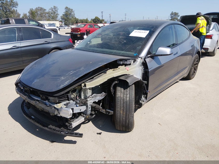 2025 Tesla Model 3 VIN 5YJ3E1EB4SF966676 IAAI salvage auction — LEFT FRONT, Salvage Title, sold $12,700 on 2026-07-09 (photo 2)