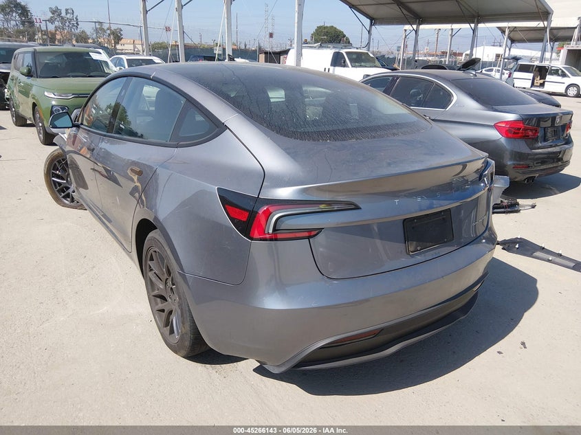 2025 Tesla Model 3 VIN 5YJ3E1EB4SF966676 IAAI salvage auction — LEFT FRONT, Salvage Title, sold $12,700 on 2026-07-09 (photo 3)
