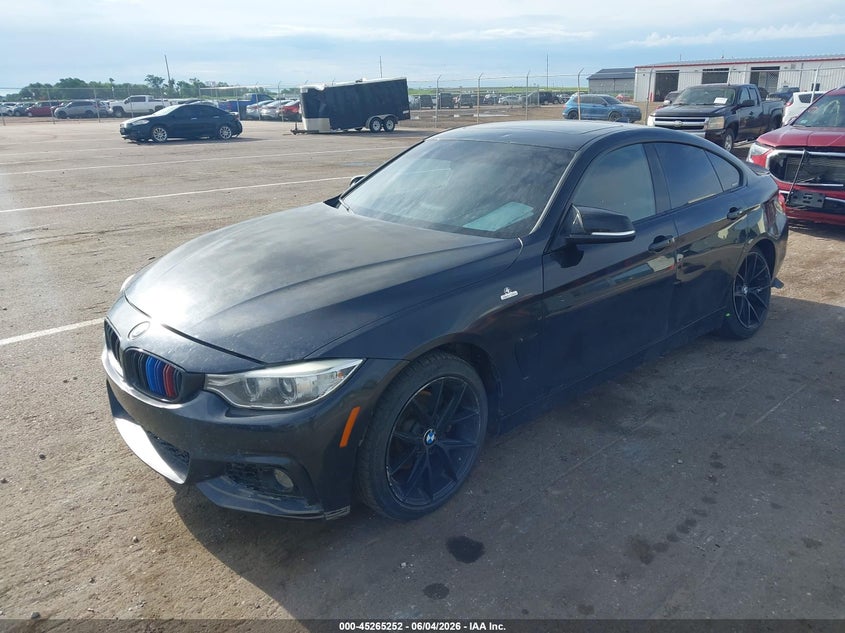 2015 BMW 4er VIN WBA4C9C56FD331796 IAAI salvage auction — REAR END, Salvage Title, sold $2,100 on 2026-09-10 (photo 2)