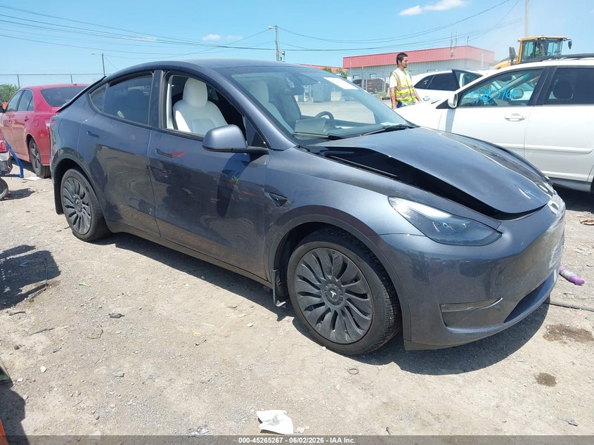 2023 Tesla Model y VIN 7SAYGDEE6PA167713 IAAI salvage auction — FRONT & REAR, Salvage Title, sold $8,600 on 2026-07-31 (photo 1)
