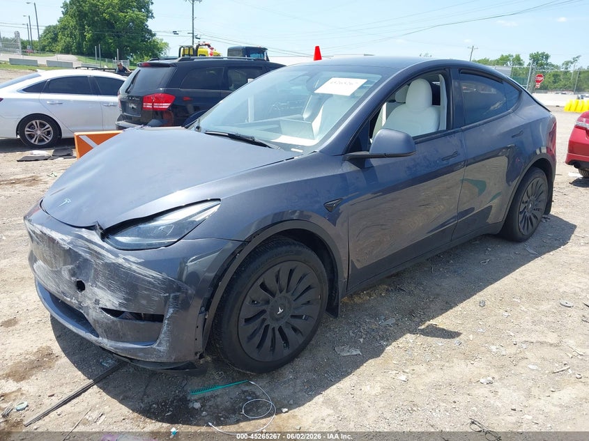 2023 Tesla Model y VIN 7SAYGDEE6PA167713 IAAI salvage auction — FRONT & REAR, Salvage Title, sold $8,600 on 2026-07-31 (photo 2)