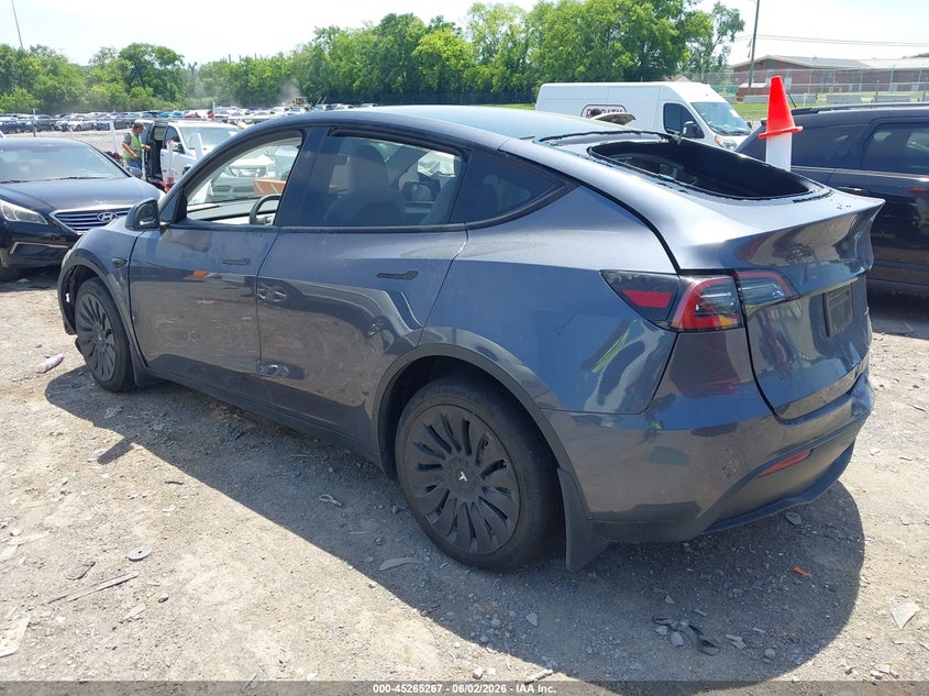 2023 Tesla Model y VIN 7SAYGDEE6PA167713 IAAI salvage auction — FRONT & REAR, Salvage Title, sold $8,600 on 2026-07-31 (photo 3)