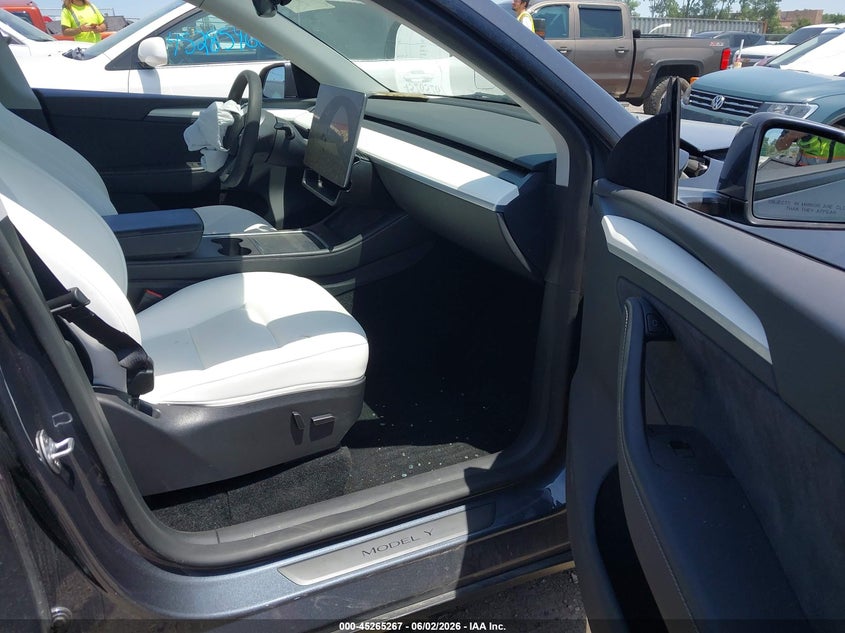 2023 Tesla Model y VIN 7SAYGDEE6PA167713 IAAI salvage auction — FRONT & REAR, Salvage Title, sold $8,600 on 2026-07-31 (photo 5)