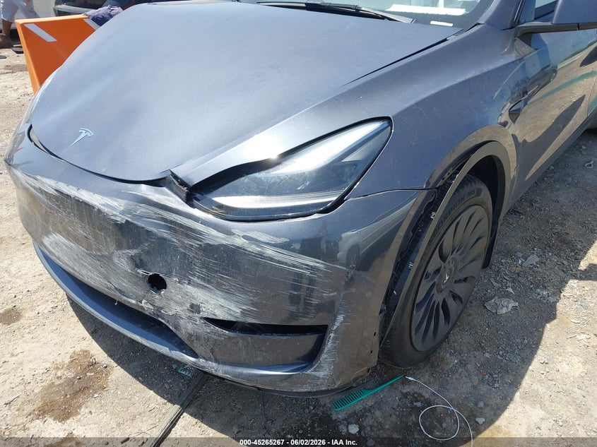 2023 Tesla Model y VIN 7SAYGDEE6PA167713 IAAI salvage auction — FRONT & REAR, Salvage Title, sold $8,600 on 2026-07-31 (photo 6)