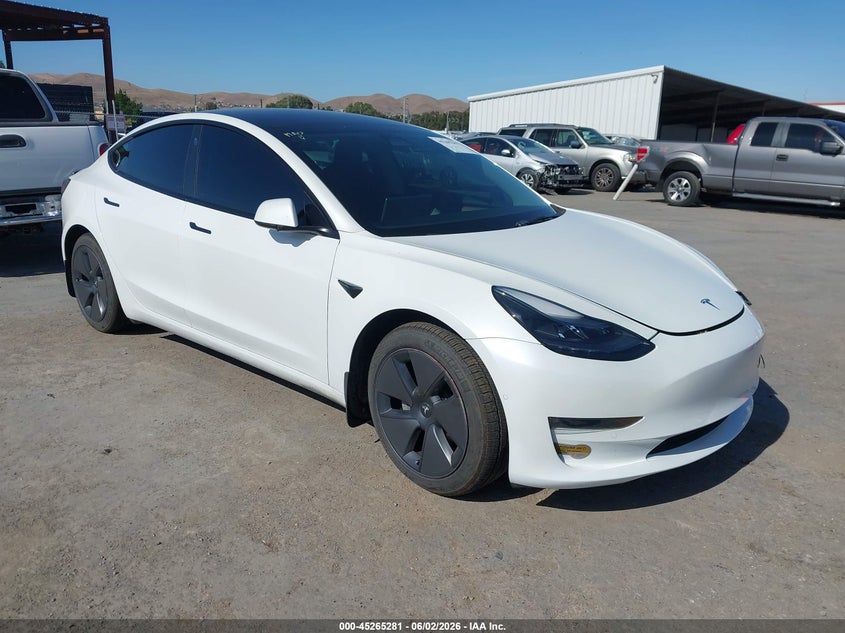2022 Tesla Model 3 VIN 5YJ3E1EB3NF323899 IAAI salvage auction — LEFT FRONT, Salvage (California), sold $8,700 on 2026-08-01 (photo 1)