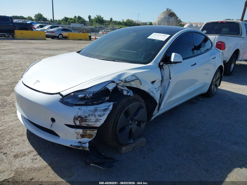 2022 Tesla Model 3 VIN 5YJ3E1EB3NF323899 IAAI salvage auction — LEFT FRONT, Salvage (California), sold $8,700 on 2026-08-01 (photo 2)