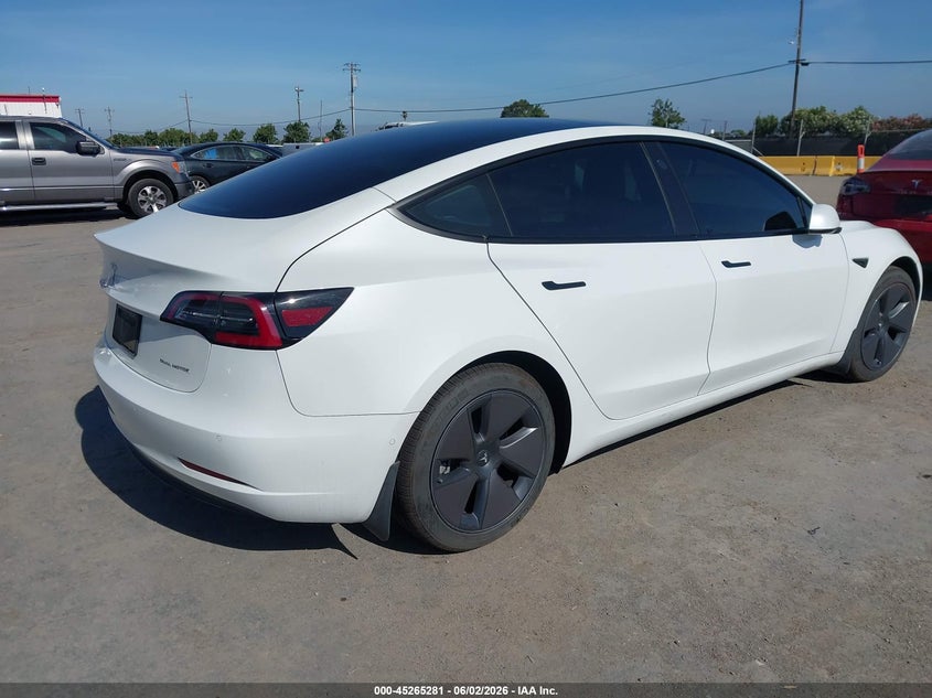 2022 Tesla Model 3 VIN 5YJ3E1EB3NF323899 IAAI salvage auction — LEFT FRONT, Salvage (California), sold $8,700 on 2026-08-01 (photo 4)