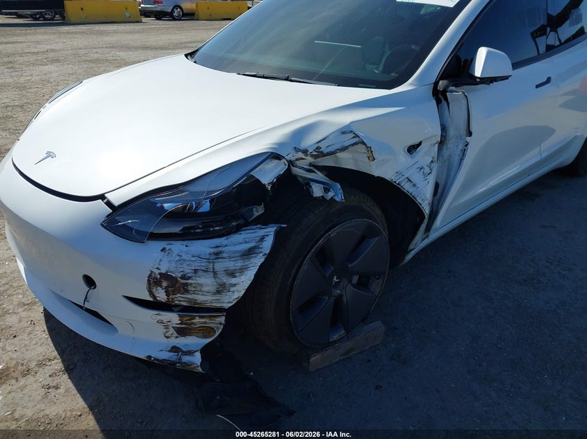 2022 Tesla Model 3 VIN 5YJ3E1EB3NF323899 IAAI salvage auction — LEFT FRONT, Salvage (California), sold $8,700 on 2026-08-01 (photo 6)