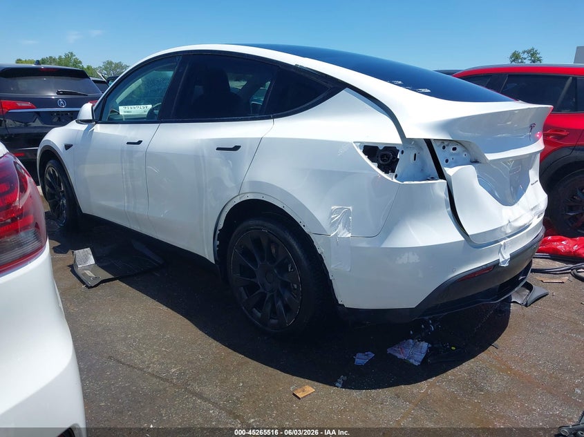 2022 Tesla Model y VIN 7SAYGAEE2NF316505 IAAI salvage auction — REAR END, Salvage Title, sold $10,700 on 2026-08-28 (photo 3)