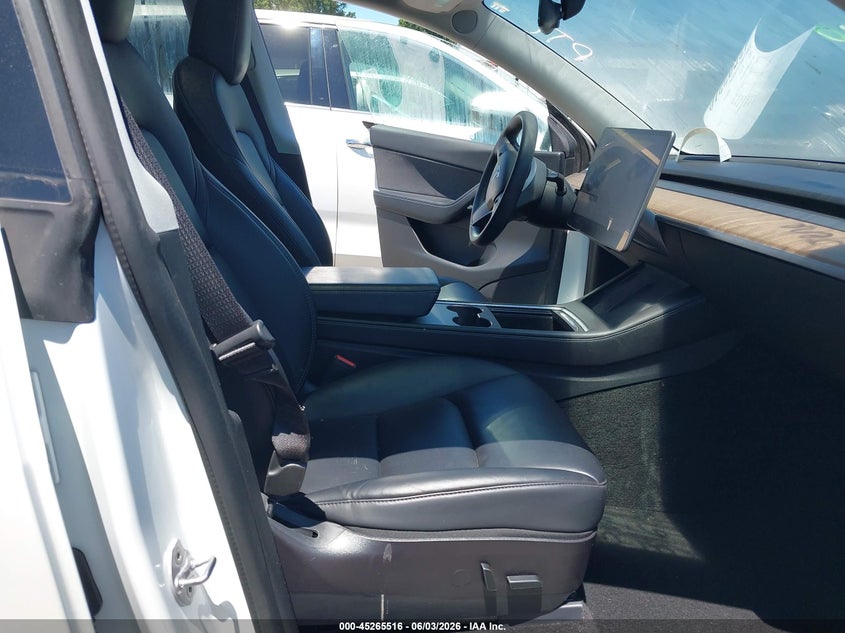 2022 Tesla Model y VIN 7SAYGAEE2NF316505 IAAI salvage auction — REAR END, Salvage Title, sold $10,700 on 2026-08-28 (photo 5)